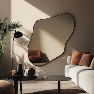 Asymmetrical wall mirror. Model L