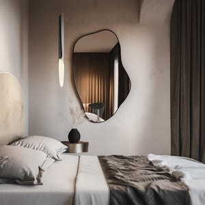 Asymmetrical wall mirror. Model a38