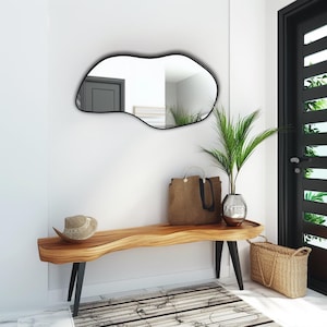 Asymmetrical wall mirror. Model CF