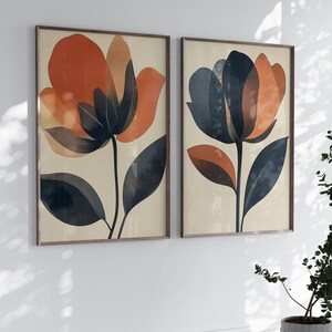 This abstract floral painting set features warm terracotta, bold orange, and deep blue tones, perfect for Japandi-style bedrooms or modern interiors. These digital prints blend organic floral forms with minimalist design, creating harmony and contrast. Ideal for those seeking abstract floral wall art, Japandi decor for bedrooms, or botanical digital posters in warm earth tones. A stylish printable set that brings calm, modern texture to curated living spaces or gallery walls.