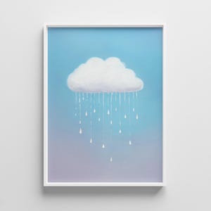 May include: A framed art print featuring a white cloud with falling raindrops against a gradient blue and purple background. The cloud is fluffy and detailed, with individual raindrops depicted as white streaks. The artwork is encased in a white frame.