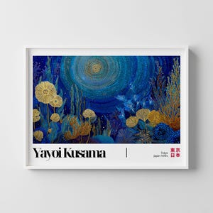 May include: A framed art print featuring a vibrant, abstract underwater scene. The artwork showcases a deep blue background with gold and yellow accents, including stylized plants and a central circular design. The artist's name, Yayoi Kusama, is displayed at the bottom.