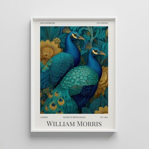 May include: A framed art print featuring two peacocks with blue and teal plumage, set against a backdrop of yellow flowers and foliage. The print includes the text "WILLIAM MORRIS" and details about the Arts & Exhibition and History of British Design.