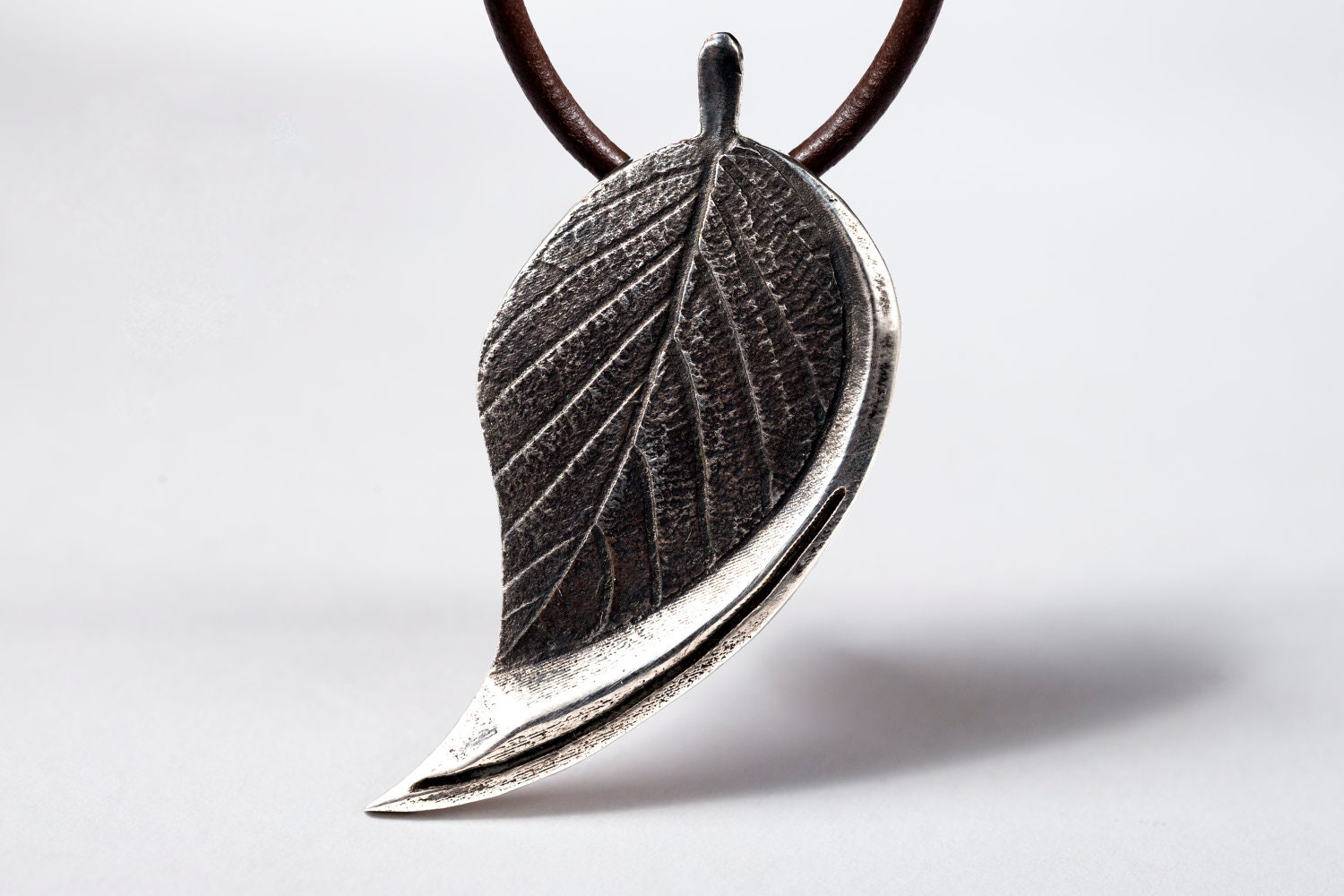 leaf jewellery, silver leaf with spiral Silver pointy leaf necklace
