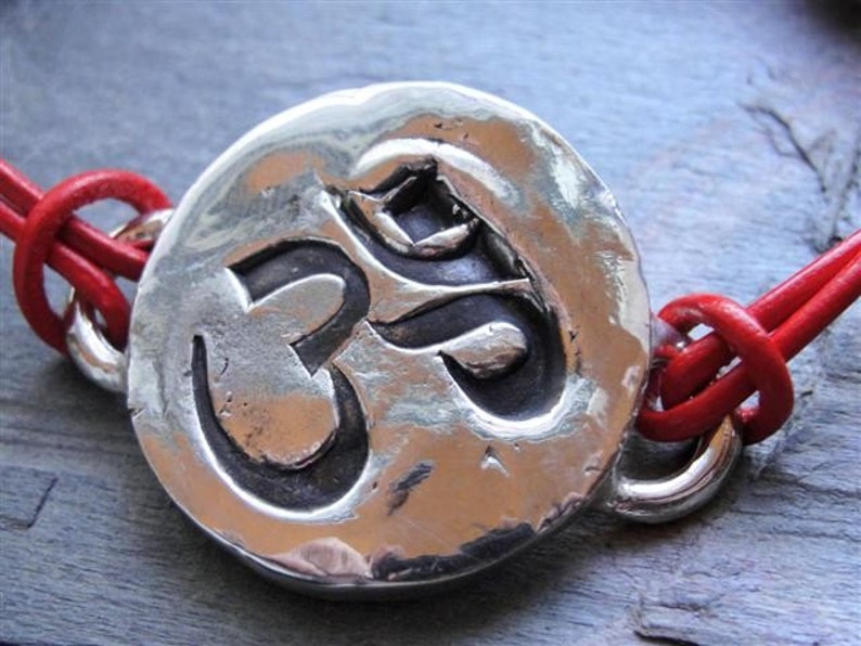 Sterling Silver Om Ohm Sign Bracelet on Red Leather image 1