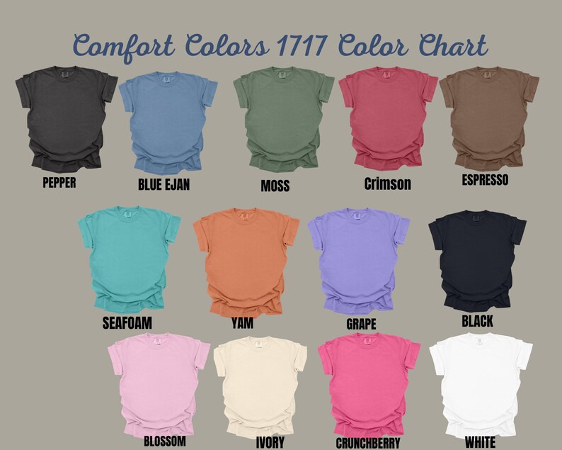 May include: Comfort Colors 1717 colour chart featuring thirteen short-sleeve t-shirts in various colours: pepper, blue jean, moss, crimson, espresso, seafoam, yam, grape, black, blossom, ivory, crunchberry, and white, each labelled below.