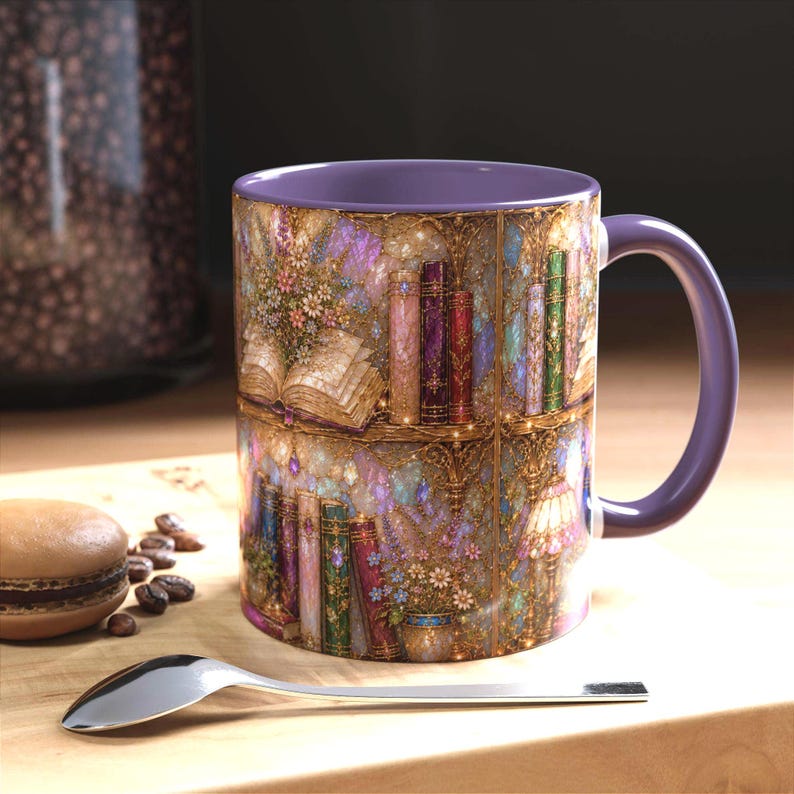 May include: A ceramic mug with a purple interior and handle, featuring a wrap-around illustration of a magical library with shelves of colorful books, blooming flowers, and glowing lights, set against a shimmering, textured, golden-toned background.