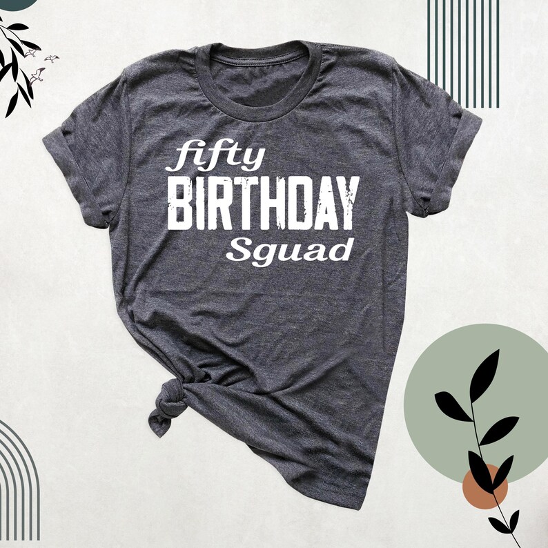 May include: Gray t-shirt with the text "fifty BIRTHDAY Squad" in white.