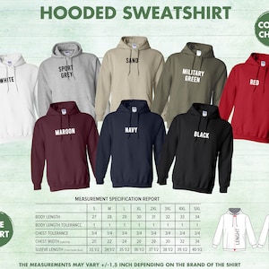 May include: Hooded sweatshirt size chart with measurements in inches. The chart shows different colors including white, sport grey, sand, military green, red, maroon, navy, and black. The chart also shows the length and width of the sweatshirt.