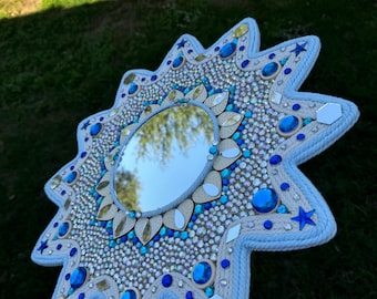 wooden star-shaped mirror