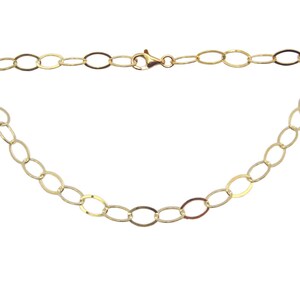 May include: A gold chain necklace with oval links.
