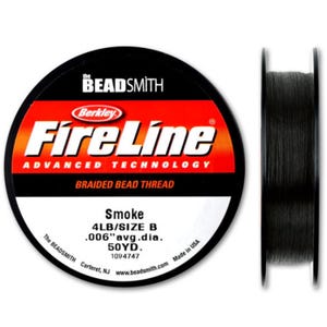 May include: A spool of black Berkley FireLine braided bead thread. The label reads "Smoke 4LB/SIZE B .006"avg.dia. 50YD. The Beadsmith Carteret, NJ www.beadsmith.com Made in USA 1094747"