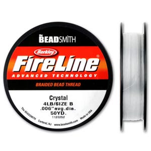 May include: A spool of white Berkley FireLine Crystal braided bead thread. The spool is labeled with the brand name, product name, and details like 4LB/SIZE B, .006" avg. dia., 50YD., and Made in USA. The spool is also labeled with the Beadsmith logo and website.