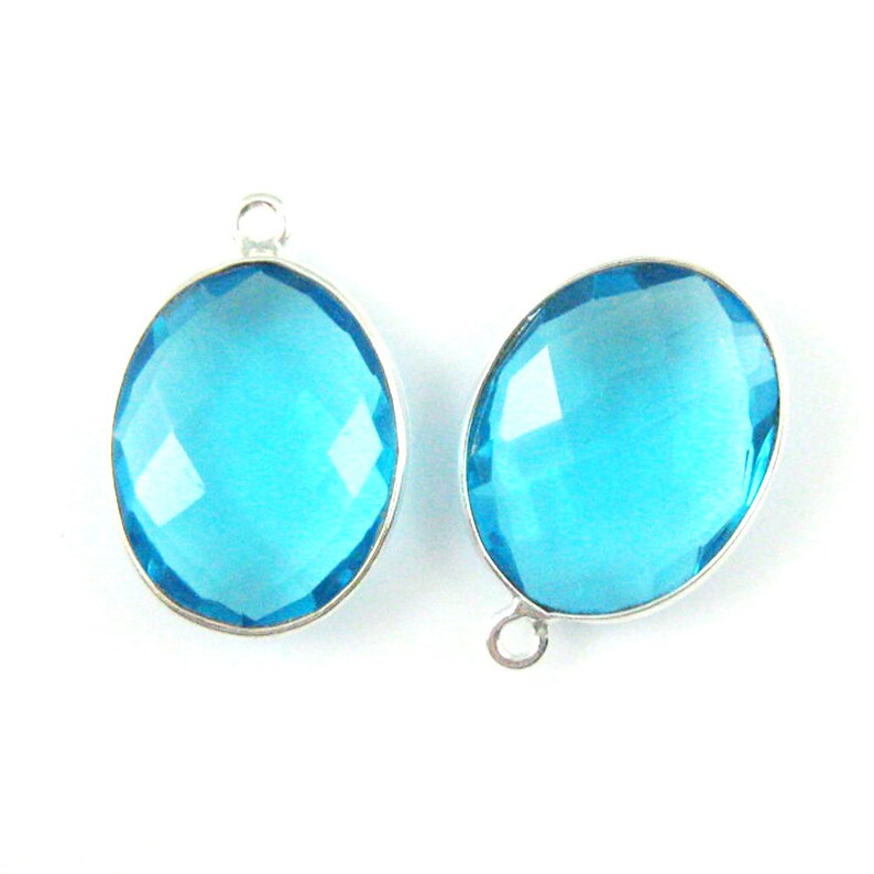 2 Pcs Bezel Gemstone Connector Peru Chalcedony 14x18mm Faceted Oval 2 Pcs Bezel Gemstone Connector Peru Chalcedony 14x18mm Faceted Oval