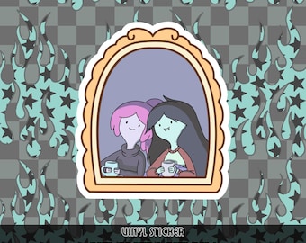 May include: A vinyl sticker featuring a cartoon illustration of two characters with pink and black hair inside a tan arched frame, holding white mugs. The background displays a repeating pattern of light blue flames and black stars.