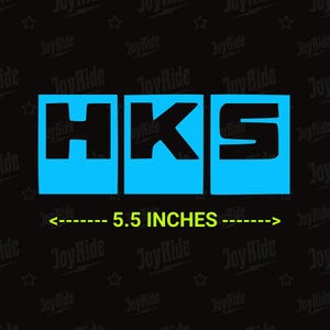 May include: A decal featuring the black letters HKS, each positioned on a bright blue rectangular background. Below the letters, a yellow graphic indicates a width of 5.5 inches with arrows pointing to the left and right.