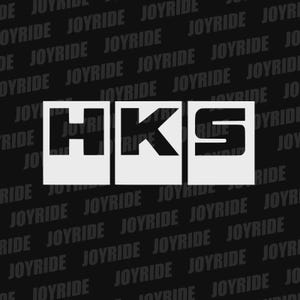 May include: White HKS logo on a black background with the word "JOYRIDE" repeated diagonally. The HKS logo is in a rectangular frame, with the letters H, K, and S in a bold, sans-serif font.