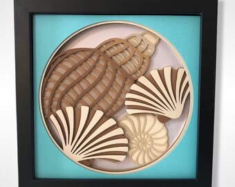 Arte en papel con conchas marinas: Caja de sombras 3D, hecha a mano.
