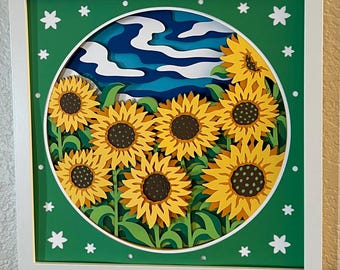 Arte en papel hecho a mano con campos de girasoles