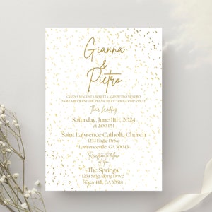 May include: Gold confetti wedding invitation with white background. The invitation reads "Gianna & Pietro Their Wedding Saturday, June 11th, 2024 at 2:00 PM Saint Lawrence Catholic Church 1234 Eagle Drive Lawrenceville, GA 30043 Reception to follow The Springs 1234 Sing Along Drive Sugar Hill, GA 30518"
