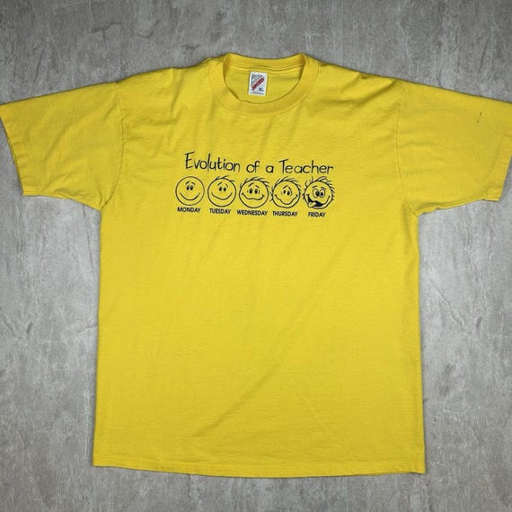 90年代ヴィンテージ「教師の進化」イエローTシャツ（アメリカ製 
