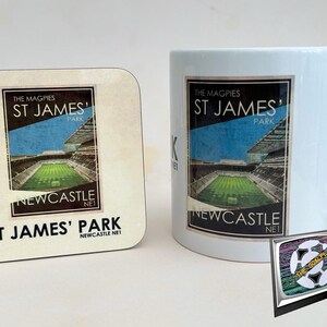 May include: A white ceramic mug with a vintage-style image of St. James' Park, home of Newcastle United Football Club. The image features the text "The Magpies St. James' Park Newcastle NE1". A matching coaster is also shown.