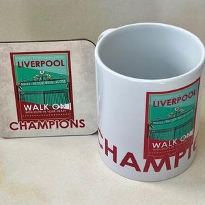 Juego de taza y posavasos del Liverpool FC 2025