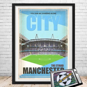 May include: A vintage-style poster featuring a blue and white color scheme with the text "You saw me standing alone City Manchester The Etihad" and a photo of a soccer stadium. A small television with a static screen showing a soccer ball with the text "The Goal Flash" is in the foreground.