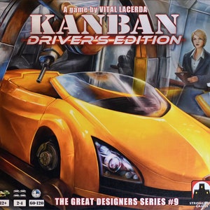 May include: A yellow car being assembled on a factory line. The game box cover for Kanban Driver's Edition, a board game by Vital Lacerda. The Great Designers Series #9.