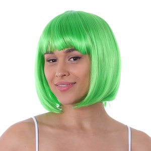 May include: A bright green wig with a blunt cut and bangs. The wig is made of synthetic hair and is styled in a bob.