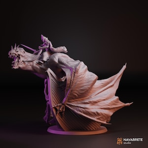 May include: A detailed sculpture of a dragon with a rider, in a neutral colour palette. The dragon has large wings and an open mouth, and the rider is holding a sword. The sculpture is set against a dark background.