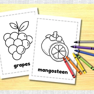 May include: Black and white coloring page featuring a bunch of grapes and a mangosteen. The words "grapes" and "mangosteen" are written below each fruit.