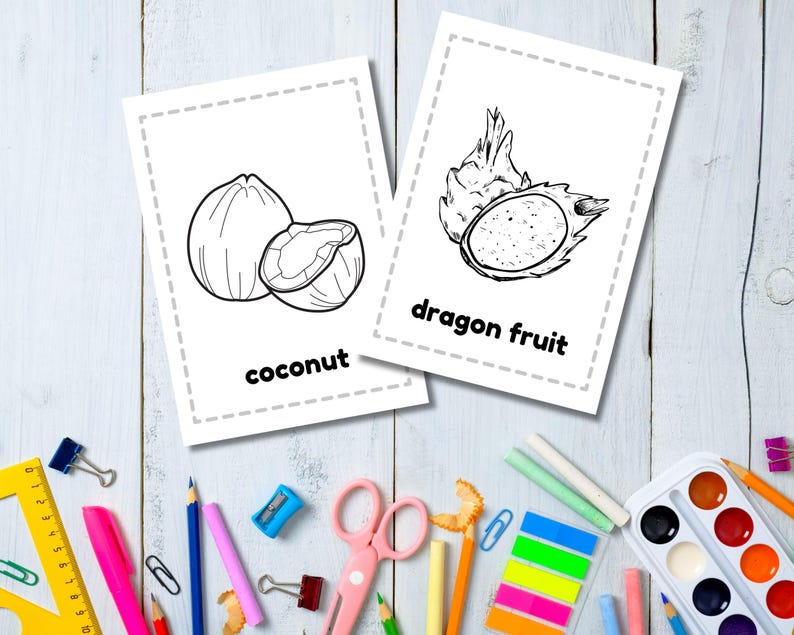 May include: Two black and white coloring pages featuring a coconut and a dragon fruit. The pages have a dashed border and the name of the fruit is written below the image.