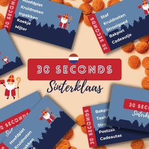 Op de afbeelding: Een bovenaanzicht van blauwe kaarten met witte tekst en illustraties van een figuur in een rood pak en hoed, met het label "30 SECONDS Sinterklaas". Kleine, ronde, bruine koekjes zijn verspreid rond de kaarten, op een lichte ondergrond.