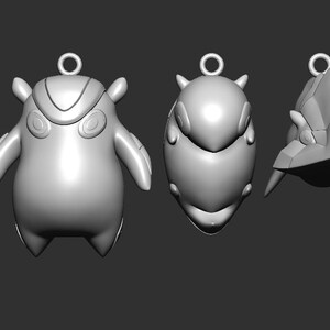 May include: Five 3D printed charms, each with a different design, are shown on a gray background. The charms are all silver in color and have a loop at the top for attaching to a necklace or bracelet. The charms are shaped like a round creature with large eyes, a round creature with a pointed head, a round creature with a flat head, a round creature with a pointed head, and a geometric shape. The charms are all about 2 inches tall. The word "GEKKO" is printed on a silver rectangular tag.