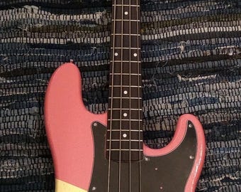 Electric Four String Bass Guitar With Neapolitan Ice Cream Finish