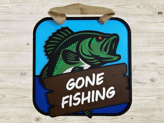 Catch the Spirit of Adventure: 'Gone Fishing' Wall Art with Leaping Bass and Rustic Charm
