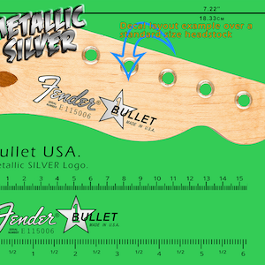 May include: A wooden guitar headstock with the text "METALLIC SILVER" and "Fender" logos. The headstock is 7.22 inches (18.33 cm) wide. Includes the text "Bullet USA. Metallic SILVER Logo."