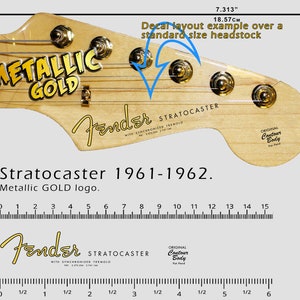 May include: A close-up of a guitar headstock with the "METALLIC GOLD" logo. The headstock features the "Fender Stratocaster" logo and the text "Stratocaster 1961-1962." The decal layout example is 7.313 inches (18.57 cm) over a standard size headstock.