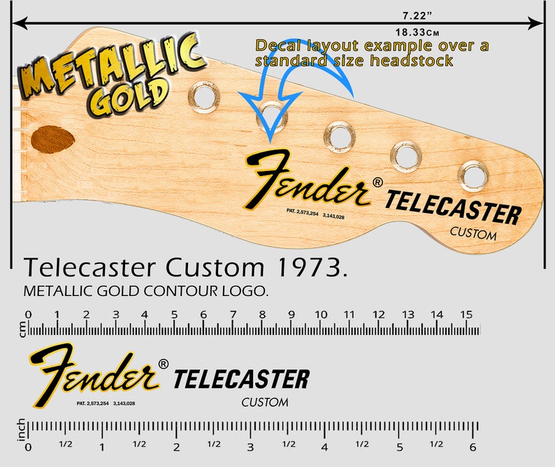 May include: A close-up of a light wood guitar headstock with a gold metallic "Telecaster Custom 1973" decal. The decal features the Fender logo and the words "Metallic Gold Contour Logo". The headstock is 7.22 inches (18.33 cm) long.