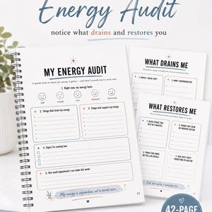 May include: A spiral-bound Energy Audit journal with white pages featuring black and blue text, including sections titled My Energy Audit, What Drains Me, and What Restores Me. The pages contain checkboxes, lines for writing, and small star icons.