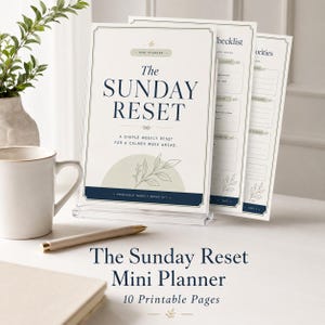 May include: A printable mini planner set titled The Sunday Reset, featuring a weekly reset guide, checklist, and priorities pages. The design includes dark blue text, a sage green semi-circle graphic, and a delicate line-art leaf illustration.