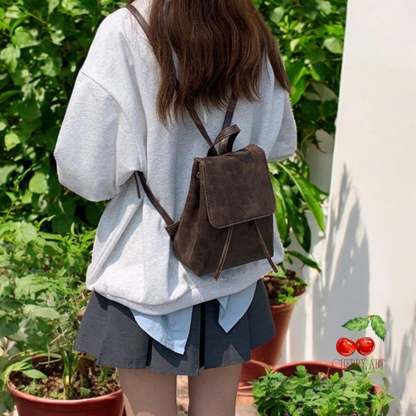 Mini mochila de couro italiana feita à mão: bolsa carteiro vintage