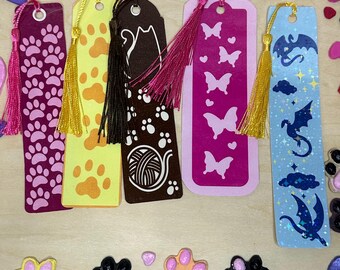 Bladwijzer dieren: pootafdrukken, vlinders, draken, poesjes