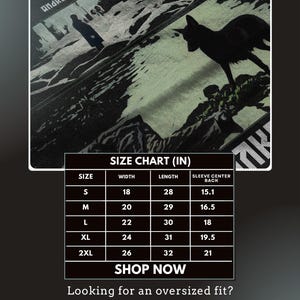 May include: Black graphic t-shirt with a wolf silhouette and text. The shirt includes a size chart with measurements in inches. The text "directed by Andrei Tarkovsky" is also visible. The brand name "VULPICRAFTS" is in the top right corner.