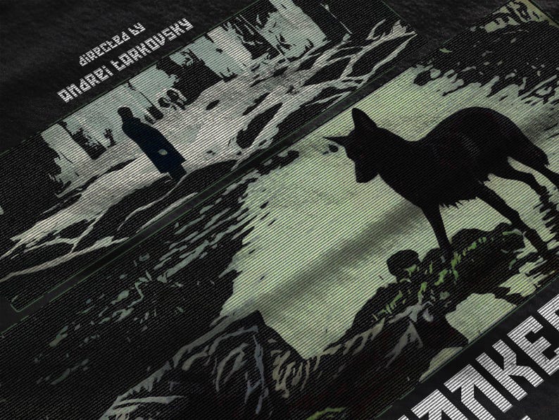 May include: Black fabric with a film-inspired design. The image features a silhouette of a figure and a wolf-like animal against a backdrop of a forest scene. Text includes "DIRECTED BY ANDREI TARKOVSKY".
