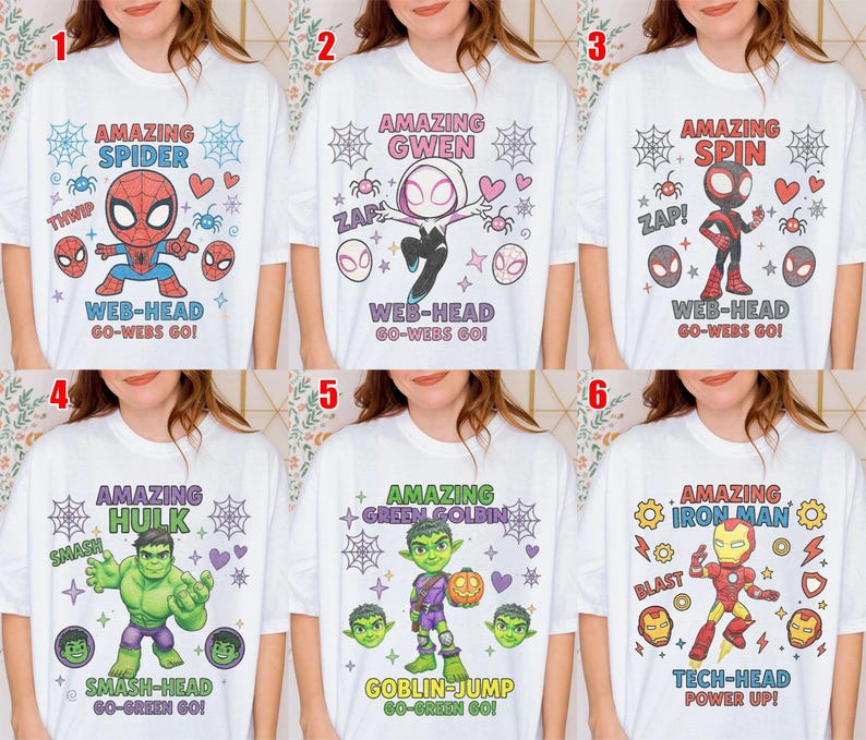 May include: A collection of six white t-shirts featuring cartoon character graphics. Designs include Spider-Man, Gwen, Spin, Hulk, Green Goblin, and Iron Man, each with character-specific text, spider webs, hearts, and various icons printed on the front.