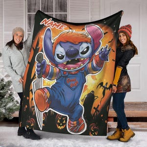 May include: A black blanket featuring a cartoon character dressed as Chucky from the horror movie franchise. The character is holding a knife and the blanket has the text "NAME" at the top. The background is orange with Halloween imagery.