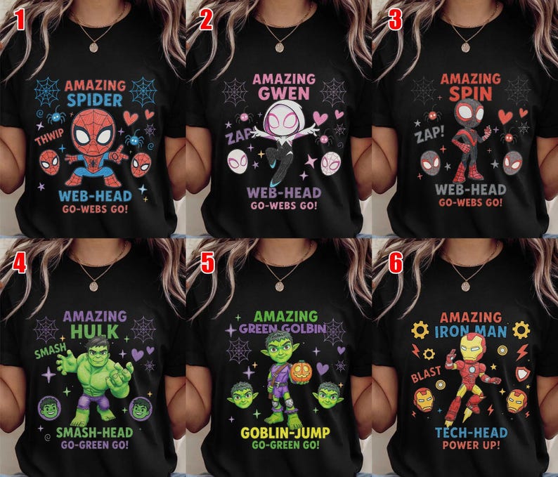 May include: A collection of six black t-shirts featuring cartoon superhero graphics. Each shirt displays a character, including Spider-Man, Gwen, Spin, Hulk, Green Goblin, and Iron Man, with associated text like Amazing Spider, Web-Head, and Go-Webs Go.
