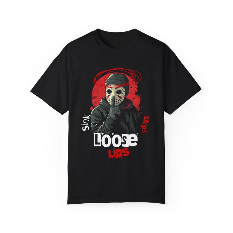Loose Lips Sink Ships streetwear t-shirt with bold urban mask graphic and grunge accents. Perfect for street hustlers, hip-hop fans, and urban fashion enthusiasts. Printed on Comfort Colors 1717 tee for comfort, durability, and style.